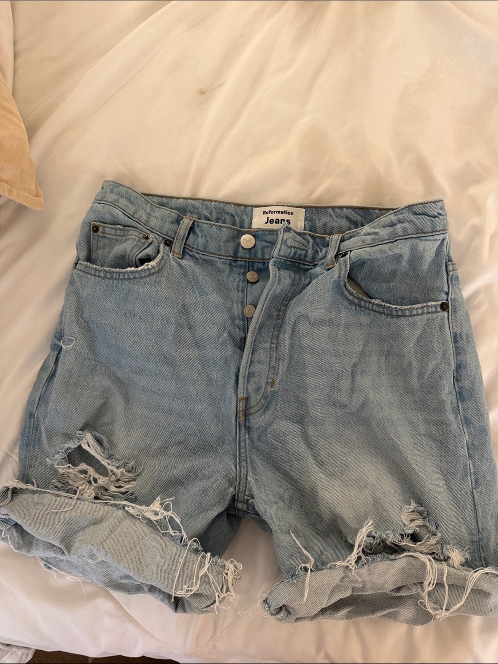 Reformation Light Wash High-Rise Distressed Jean Shorts